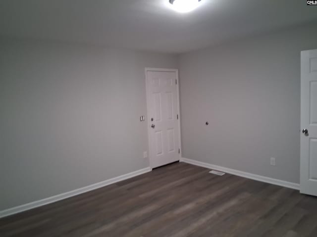 1904 Elise Rd, Columbia, SC 29210 - empty room with dark wood finished floors and baseboards