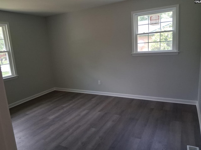 1904 Elise Rd, Columbia, SC 29210 - spare room featuring dark wood-style flooring and baseboards