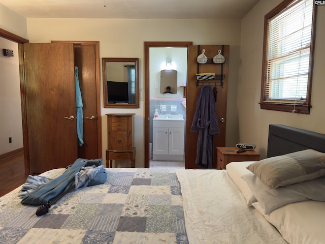 2313 Omega Dr, Columbia, SC 29223 - bedroom featuring a sink and connected bathroom