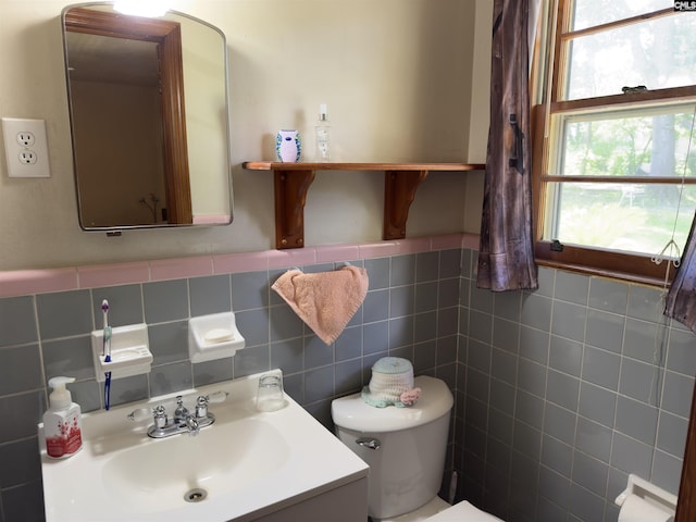 2313 Omega Dr, Columbia, SC 29223 - bathroom featuring toilet, tile walls, and vanity