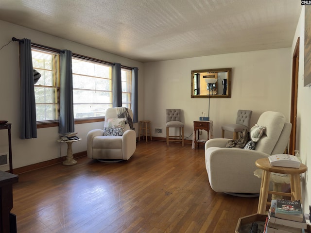 2313 Omega Dr, Columbia, SC 29223 - sitting room with hardwood / wood-style flooring, baseboards, and a textured ceiling