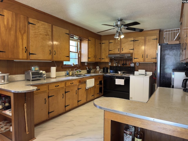 2313 Omega Dr, Columbia, SC 29223 - kitchen with black electric range oven, ceiling fan, light countertops, brown cabinetry, and a textured ceiling