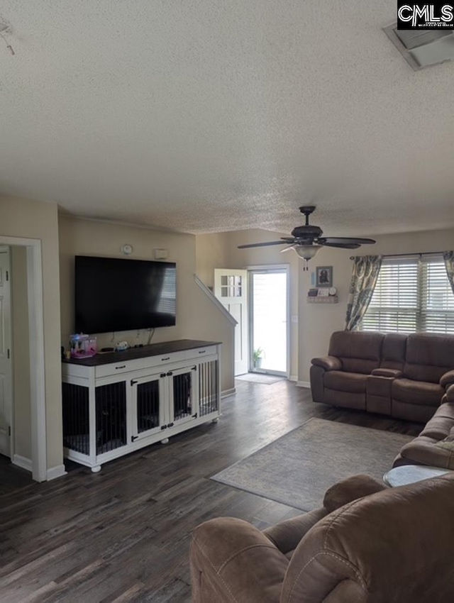 304 Cutter Ct, Chapin, SC 29036 - living room with a textured ceiling, dark wood-type flooring, a ceiling fan, and baseboards