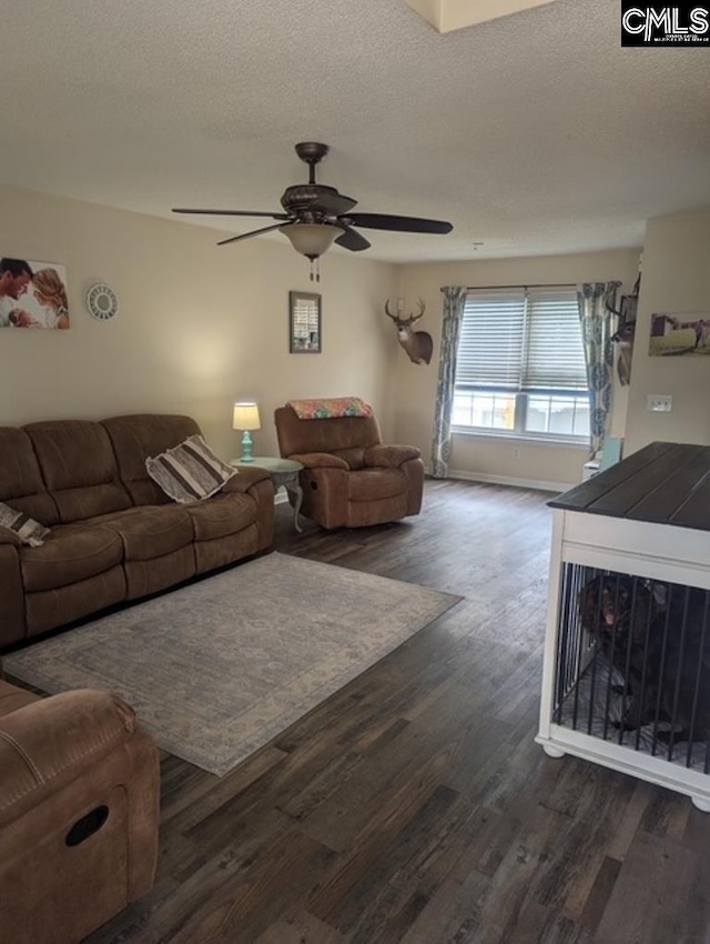 304 Cutter Ct, Chapin, SC 29036 - living area featuring dark wood-style floors, ceiling fan, a textured ceiling, and baseboards