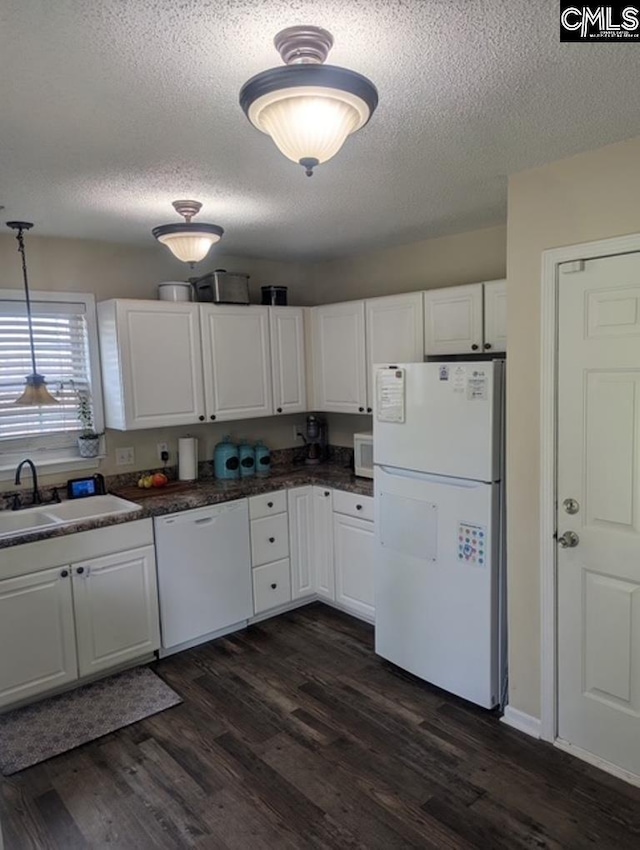 304 Cutter Ct, Chapin, SC 29036 - kitchen featuring white appliances, a sink, white cabinets, dark countertops, and a textured ceiling
