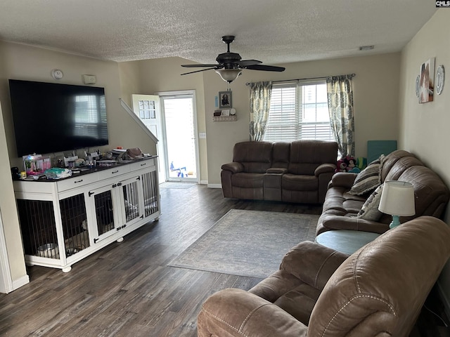 304 Cutter Ct, Chapin, SC 29036 - living room featuring a textured ceiling, a ceiling fan, dark wood-style flooring, and baseboards
