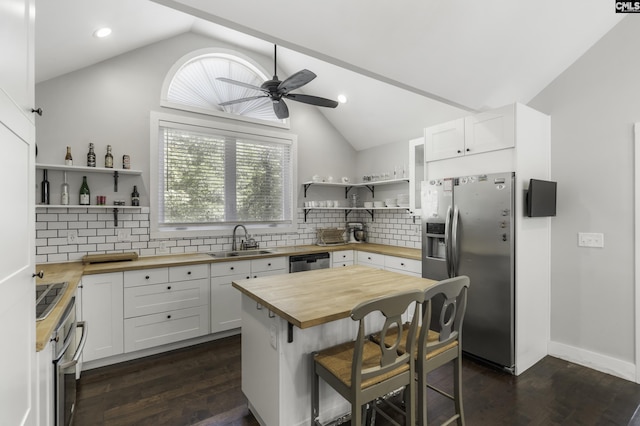 2033 Old Hilton Rd, Chapin, SC 29036 - kitchen with wooden counters, open shelves, stainless steel appliances, a sink, and vaulted ceiling