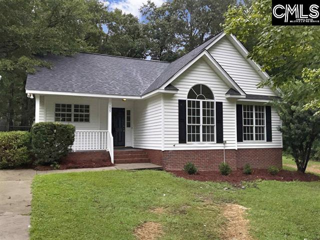 single story home with a front yard, a porch, and roof with shingles