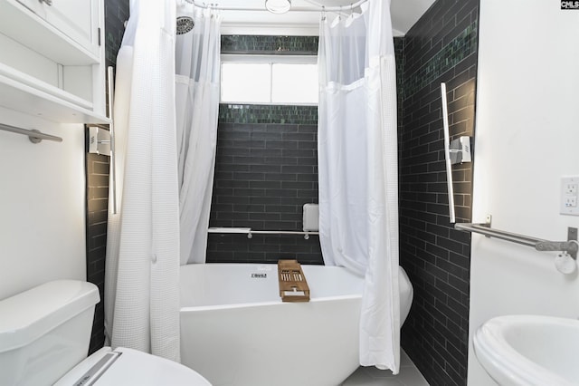 728 Laurel St, Columbia, SC 29201 - bathroom with shower / bath combo with shower curtain and toilet