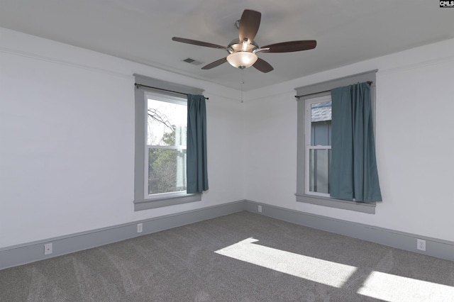 728 Laurel St, Columbia, SC 29201 - empty room with carpet flooring, a ceiling fan, and baseboards