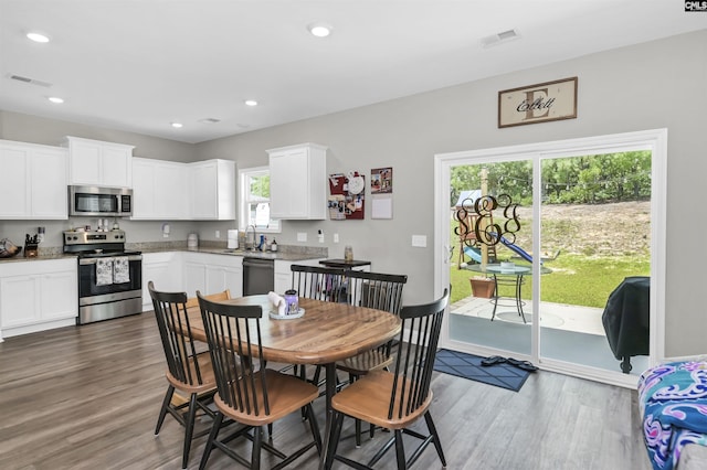 245 Long Iron Ct, West Columbia, SC 29172 - dining room featuring wood finished floors and recessed lighting