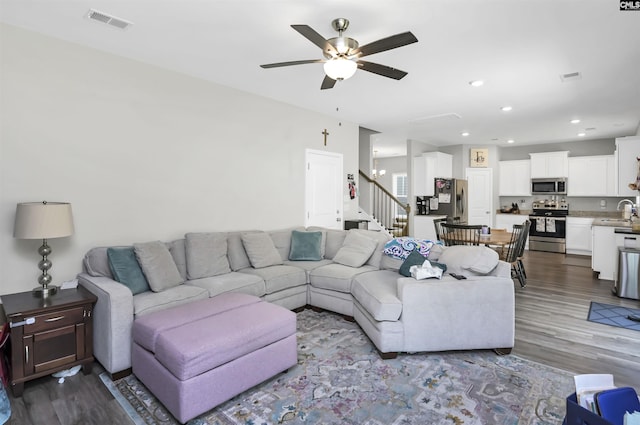245 Long Iron Ct, West Columbia, SC 29172 - living area featuring stairs, wood finished floors, a ceiling fan, and recessed lighting