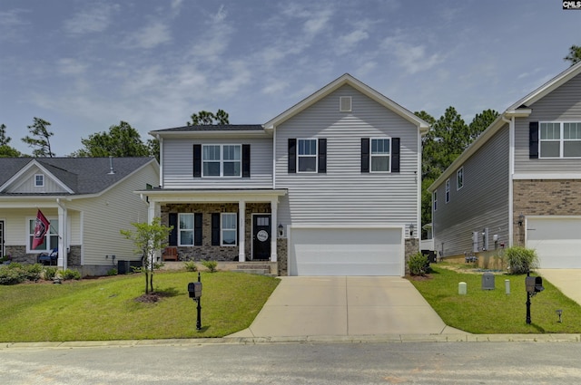 245 Long Iron Ct, West Columbia, SC 29172 - view of front facade featuring an attached garage, concrete driveway, a front lawn, and stone siding