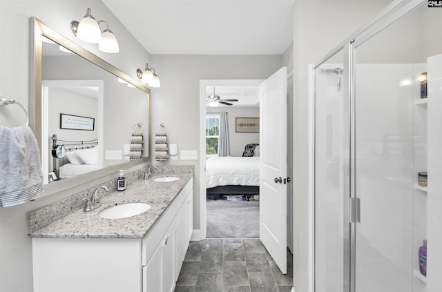 245 Long Iron Ct, West Columbia, SC 29172 - bathroom with ensuite bathroom, a ceiling fan, a shower stall, and double vanity