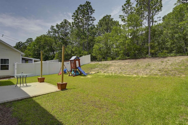 245 Long Iron Ct, West Columbia, SC 29172 - view of yard with a playground, a patio area, and view of wooded area