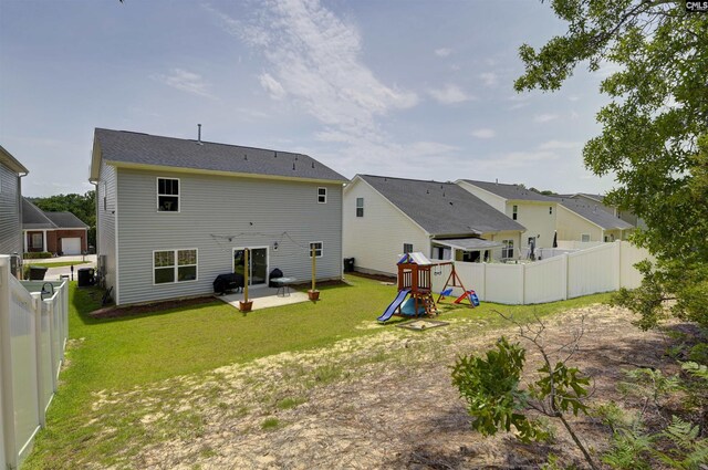 245 Long Iron Ct, West Columbia, SC 29172 - rear view of property featuring a patio area and a playground