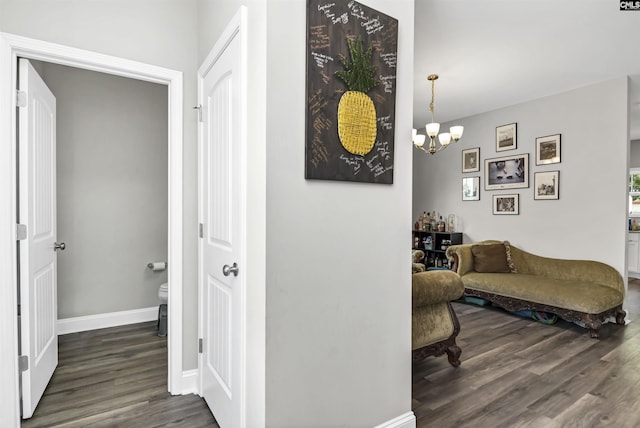 245 Long Iron Ct, West Columbia, SC 29172 - hallway with wood finished floors, a chandelier, and baseboards