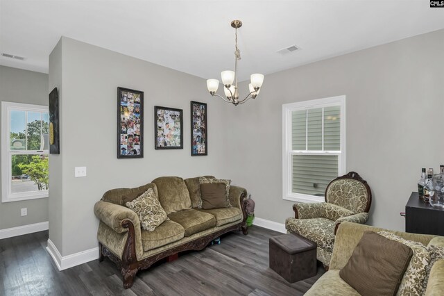 245 Long Iron Ct, West Columbia, SC 29172 - living room featuring a chandelier, dark wood-type flooring, and baseboards