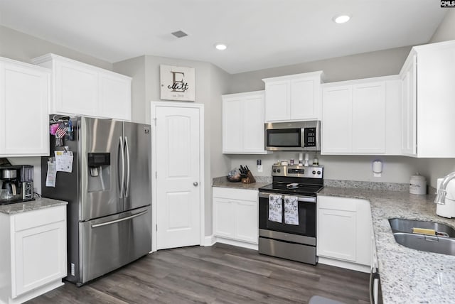 245 Long Iron Ct, West Columbia, SC 29172 - kitchen with stainless steel appliances, a sink, white cabinets, and recessed lighting