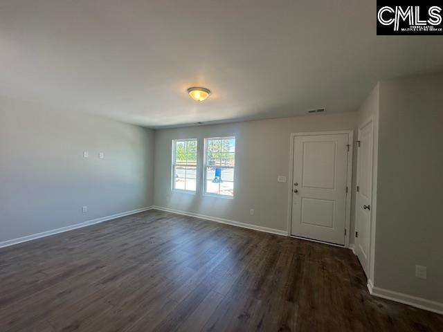 1023 Skyline Rd, Columbia, SC 29229 - empty room featuring dark wood-style floors and baseboards