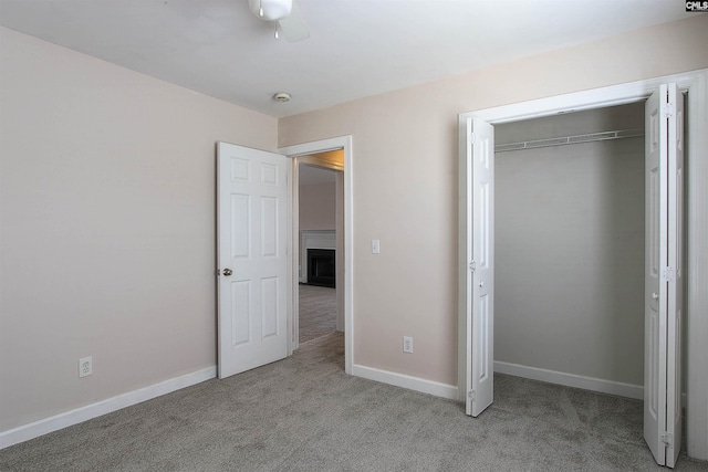 1 Duffie Ct, Columbia, SC 29229 - unfurnished bedroom featuring carpet, a fireplace, baseboards, a closet, and ceiling fan