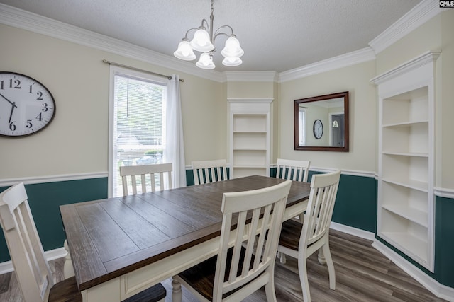6 Hedgefield Ct, Irmo, SC 29063 - dining area with a chandelier, dark wood-type flooring, a textured ceiling, crown molding, and built in features