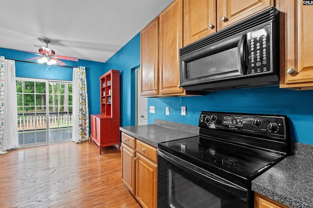 306 Austree Dr, Columbia, SC 29229 - kitchen featuring black appliances, dark countertops, light wood-style floors, ceiling fan, and brown cabinets