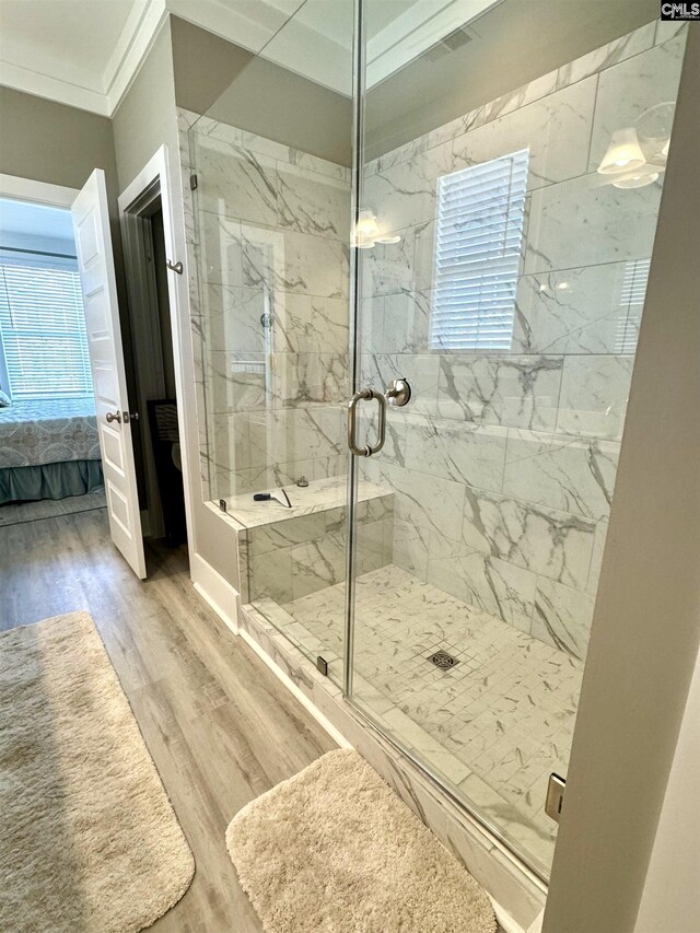 2215 High Bluff Loop, Lexington, SC 29072 - ensuite bathroom featuring wood finished floors, a marble finish shower, and crown molding