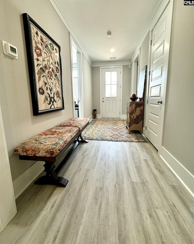 2215 High Bluff Loop, Lexington, SC 29072 - entryway with wood finished floors, ornamental molding, and baseboards