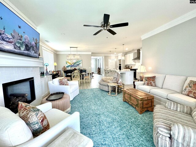 2215 High Bluff Loop, Lexington, SC 29072 - living room with ceiling fan, ornamental molding, a fireplace, light wood-style flooring, and recessed lighting