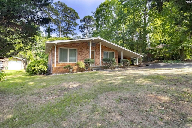 1514 Omarest Dr, Columbia, SC 29210 - view of front of home featuring brick siding, a front yard, and an attached carport