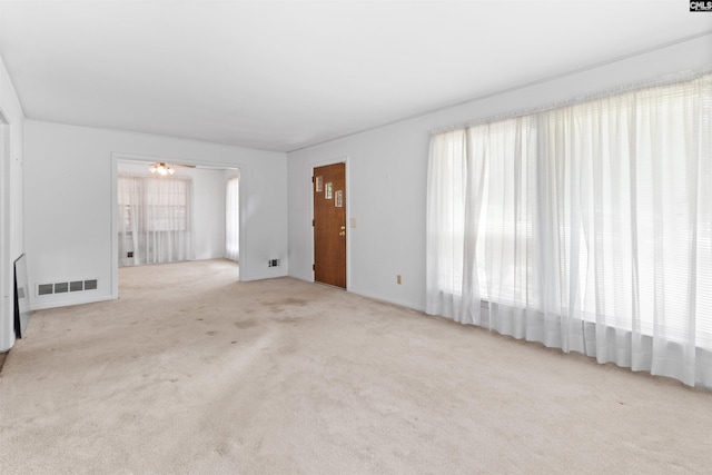 1514 Omarest Dr, Columbia, SC 29210 - unfurnished living room featuring healthy amount of natural light and carpet