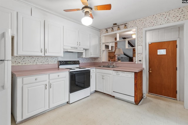 1514 Omarest Dr, Columbia, SC 29210 - kitchen with white appliances, a sink, white cabinets, ceiling fan, and light flooring