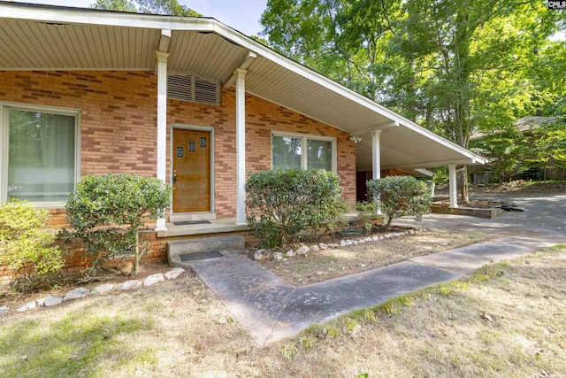 1514 Omarest Dr, Columbia, SC 29210 - view of exterior entry with brick siding and covered porch