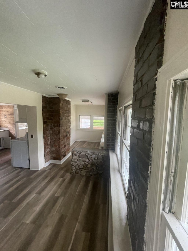 2803 Stewart St, Camden, SC 29020 - unfurnished living room with wood finished floors and baseboards