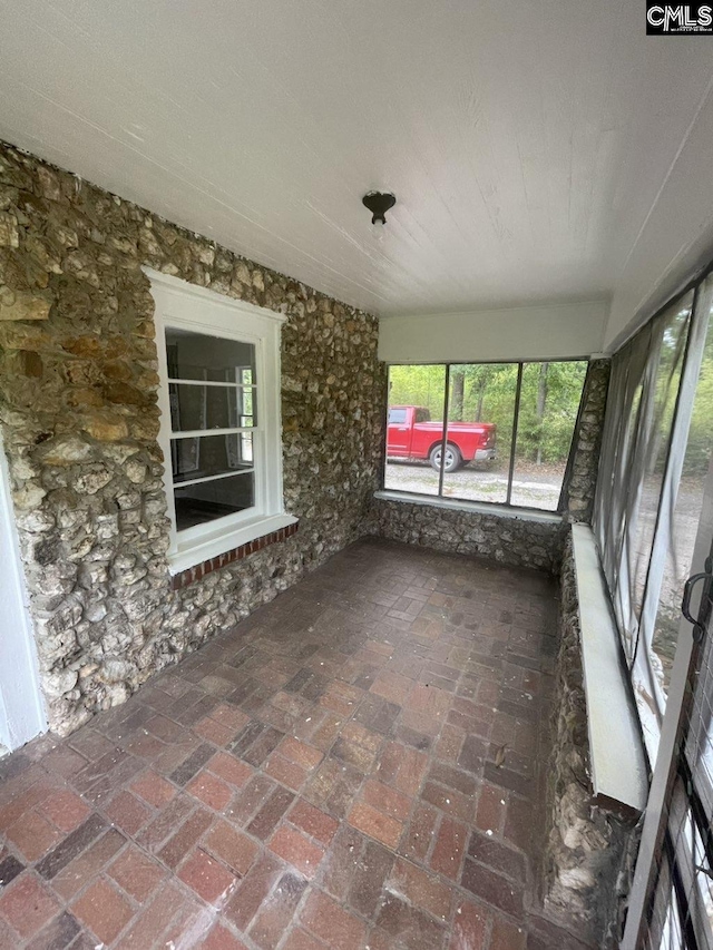 2803 Stewart St, Camden, SC 29020 - unfurnished sunroom featuring brick floors