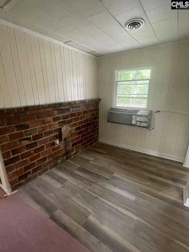 2803 Stewart St, Camden, SC 29020 - spare room with dark wood-style flooring and wooden walls