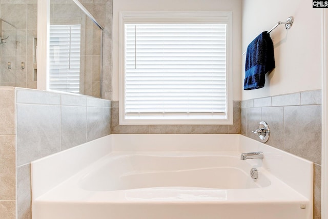 121 Bridgeport Rd, Elgin, SC 29045 - bathroom with a garden tub and a tile shower
