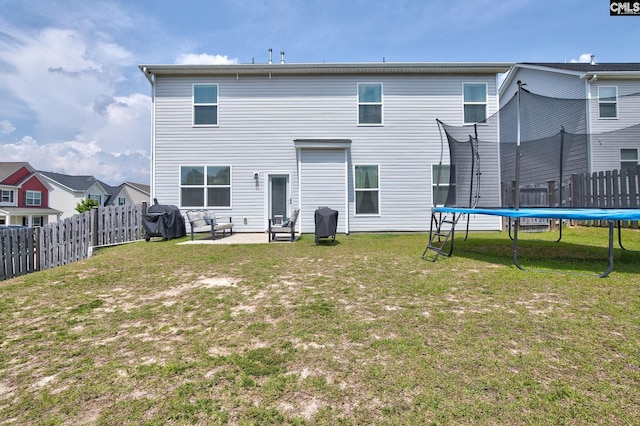 121 Bridgeport Rd, Elgin, SC 29045 - rear view of property with a trampoline and a patio area