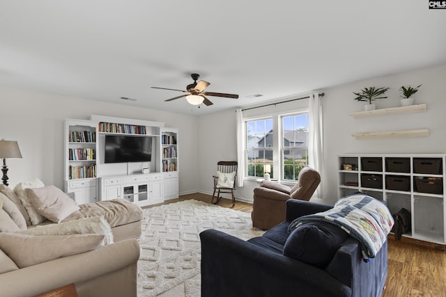 150 Ventnor Ave, Chapin, SC 29036 - living room featuring ceiling fan, wood finished floors, and baseboards