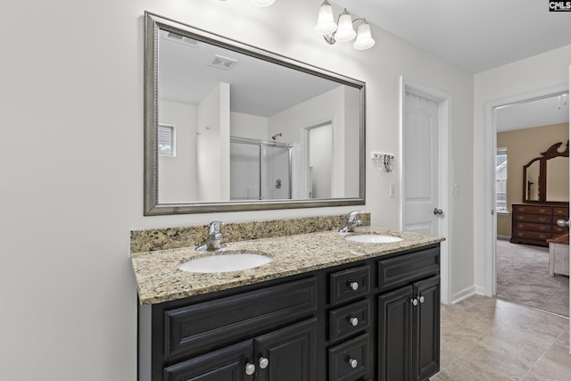 150 Ventnor Ave, Chapin, SC 29036 - full bath with a stall shower, double vanity, and baseboards
