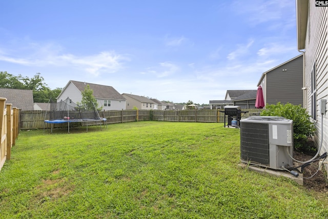 150 Ventnor Ave, Chapin, SC 29036 - view of yard featuring central air condition unit, a trampoline, and a residential view