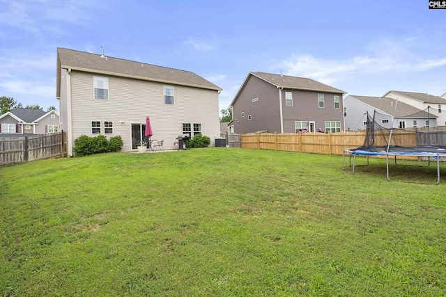 150 Ventnor Ave, Chapin, SC 29036 - back of house with a trampoline, cooling unit, and a residential view