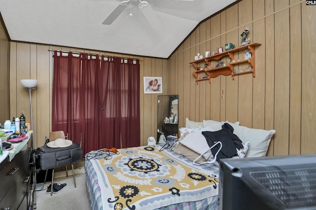 3334 Spring Dr, West Columbia, SC 29170 - carpeted bedroom with vaulted ceiling, a textured ceiling, wood walls, and a ceiling fan