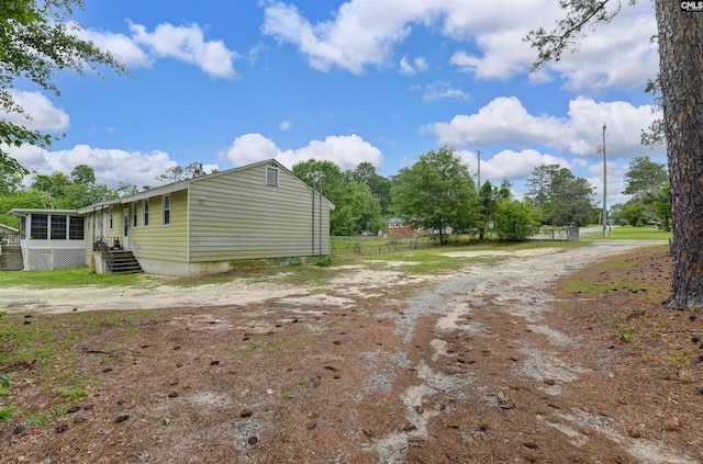 3334 Spring Dr, West Columbia, SC 29170 - view of home's exterior featuring a sunroom