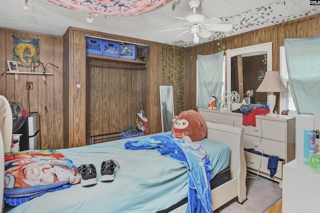 3334 Spring Dr, West Columbia, SC 29170 - bedroom with wood walls and ceiling fan