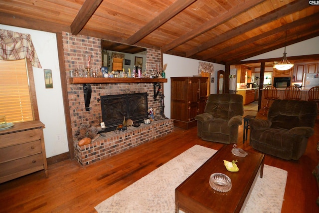 141 Frost Rd, Camden, SC 29020 - living room with wood ceiling, wood finished floors, and a brick fireplace