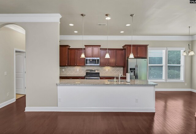 1 Downing Cir, Gilbert, SC 29054 - kitchen featuring appliances with stainless steel finishes, arched walkways, crown molding, dark wood finished floors, and decorative backsplash