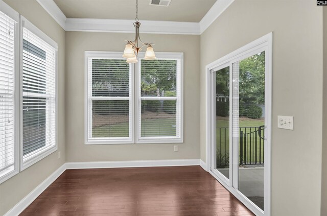 1 Downing Cir, Gilbert, SC 29054 - unfurnished dining area with dark wood finished floors, a chandelier, crown molding, and baseboards
