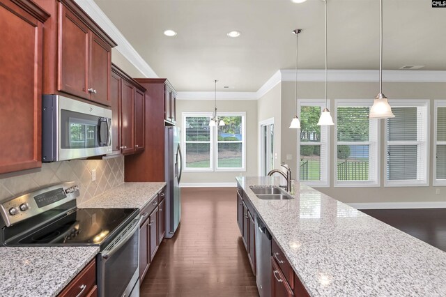 1 Downing Cir, Gilbert, SC 29054 - kitchen with appliances with stainless steel finishes, a sink, baseboards, crown molding, and tasteful backsplash